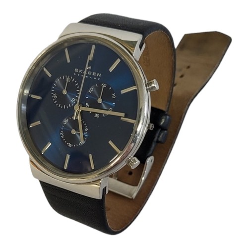 145 - SKAGEN, A DANISH STAINLESS STEEL GENTS GENTS CHRONOGRAPH WRISTWATCH
Having a blue tone dial and blac... 