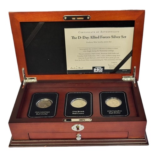 141 - A D-DAY ALLIED FORCES SILVER COIN SET
Comprising a 1944 American Half Dollar, 1944 British Half Crow... 