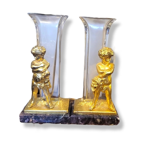 394 - A PAIR OF GILT BRONZE, BLUE JOHN AND GLASS FIGURAL VASES
The trumpet form glass vase with classical ... 