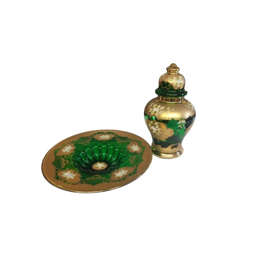 377 - A LATE 20TH CENTURY BOHEMIAN GREEN FLUSHED GLASS LUSTRE GINGER JAR AND COVER
The globular body overl... 