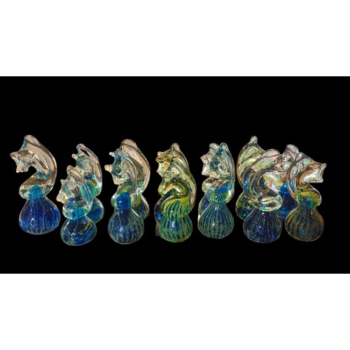 385 - MDINA, A COLLECTION OF TWELVE ART GLASS SEAHORSE PAPERWEIGHTS
Marine blue bearing engraved mark to b... 