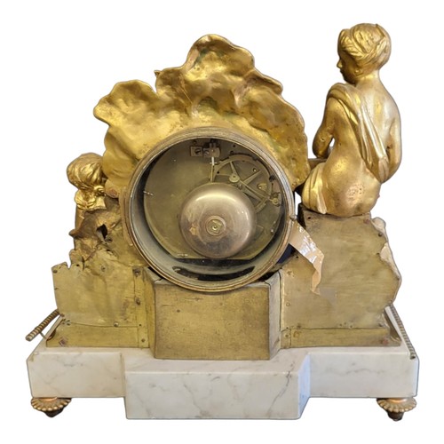 176 - A LARGE 19TH CENTURY FRENCH GILDED BRONZE AND WHITE MARBLE MANTLE CLOCK
Figured with semi nude figur... 