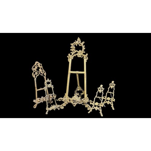 184 - A COLLECTION OF FIVE 20TH CENTURY BRASS EASEL PICTURE STANDS
Scrolled Rococo form.
(largest approx 2... 