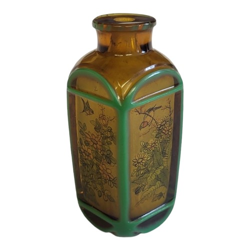 146 - A 19TH CENTURY CHINESE AMBER GLASS SCENT BOTTLE
With internal painted decoration in the form of bird... 