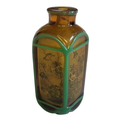 146 - A 19TH CENTURY CHINESE AMBER GLASS SCENT BOTTLE
With internal painted decoration in the form of bird... 