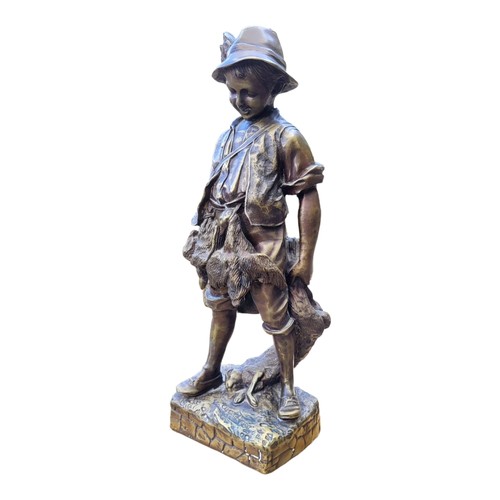 181 - AFTER AUGUSTE CACE, A 20TH CENTURY BRONZE SCULPTURE
Titled 'L'enfant Chasseur', boy with pheasant an... 