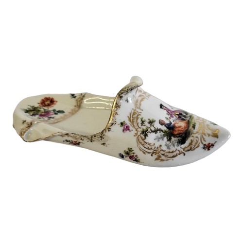 260 - MEISSEN, A 19TH CENTURY HARD PASTE PORCELAIN NOVELTY MODEL OF A SHOE/SLIPPER
Painted with Watteauesq... 