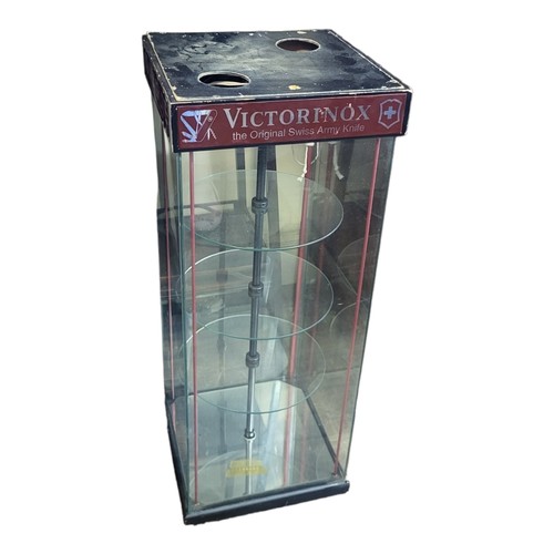 1224 - A VINTAGE VICTORINOX SWISS ARMY KNIVES SHOPS TABLE TOP GLASS DISPLAY CABINET, with circular interior... 