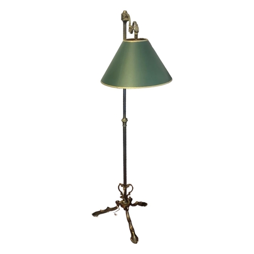 1221 - AN EDWARDIAN STYLE BRASS TELESCOPIC STANDARD LAMP
Complete with shade.
(142cm)

Condition: good over... 