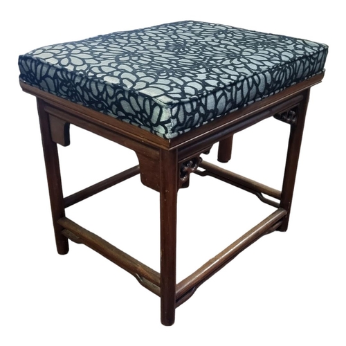 1223 - A CHINESE HARDWOOD STOOL
With upholstered seat above a carved and pierced apron, on turned legs.
(63... 