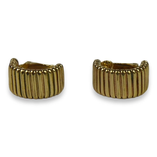 71A - CHRISTIAN DIOR, A PAIR OF GOLD TONE EARRINGS Having clip on backs. (18mm x 10mm x 16mm)