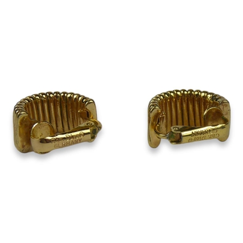 71A - CHRISTIAN DIOR, A PAIR OF GOLD TONE EARRINGS Having clip on backs. (18mm x 10mm x 16mm)