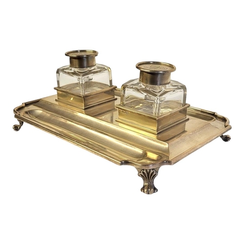 16 - ELKINGTON, A LARGE VICTORIAN SILVER AND GLASS INKSTAND
Twin glass bottles with hinged silver lids, o... 