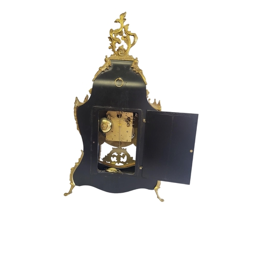 2 - LAURIS, A 20TH CENTURY WALNUT AND GILT BRASS BRACKET CLOCK
Having a pierced brass scrolled finial an... 