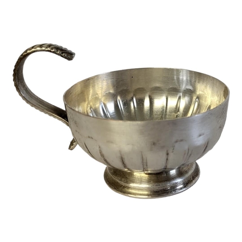 34 - A LARGE 20TH CENTURY SILVER  PLATE ON COPPER  PUNCH BOWL AND CUPS
Having a gadrooned border,lion mas... 