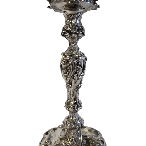 45 - WALKER AND HALL, A LARGE VICTORIAN SILVER CANDELABRA
Having two scrolled arms with embossed decorati... 