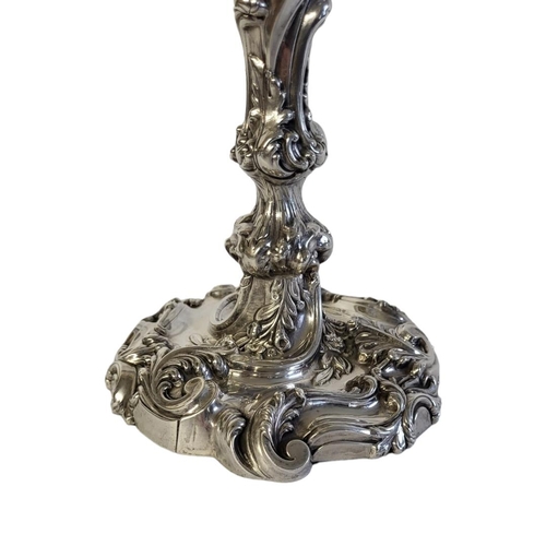 45 - WALKER AND HALL, A LARGE VICTORIAN SILVER CANDELABRA
Having two scrolled arms with embossed decorati... 