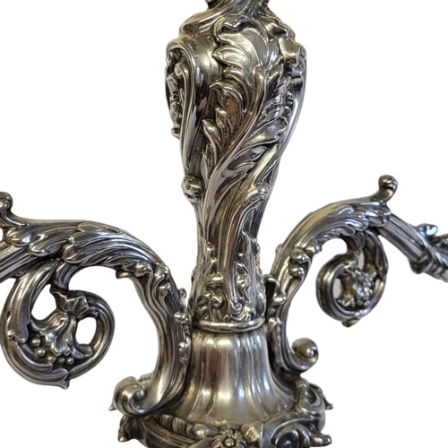 45 - WALKER AND HALL, A LARGE VICTORIAN SILVER CANDELABRA
Having two scrolled arms with embossed decorati... 