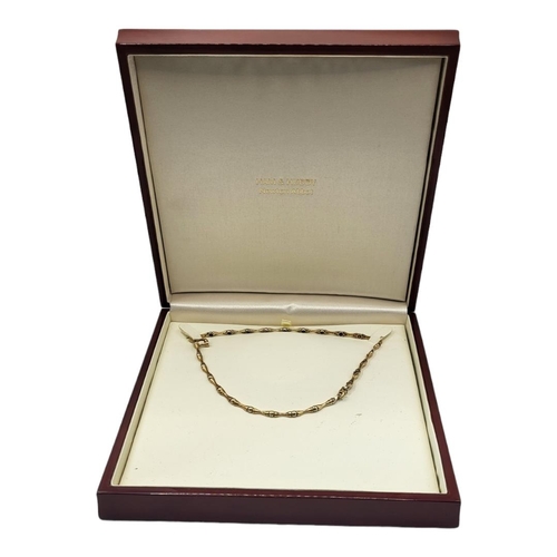 57A - A MID 20TH CENTURY HAM AND HUDDY 9CT GOLD NECKLACE 
Set with trace link chain, fully marked ‘375’, i... 