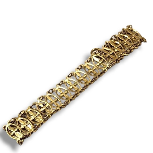 58A - A HAM AND HUDDY 9CT GOLD GATE LINK BRACELET 
With delicate pierced openwork decoration, fully marked... 