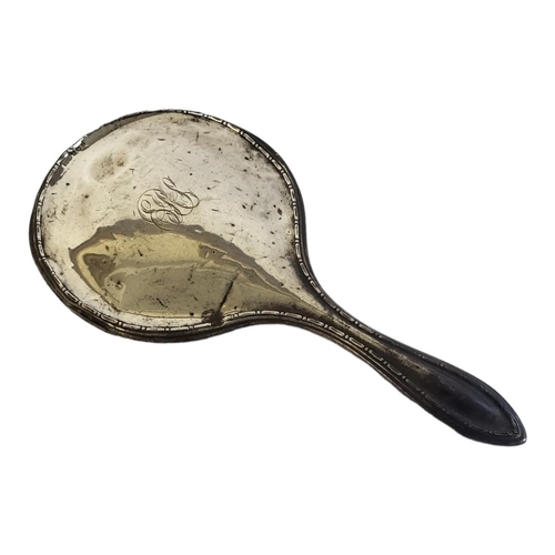 62 - AN ART DECO HALLMARKED SILVER MOUNTED LADIES’ VANITY MIRROR
Birmingham, 1924, by David Munsey.
(leng... 