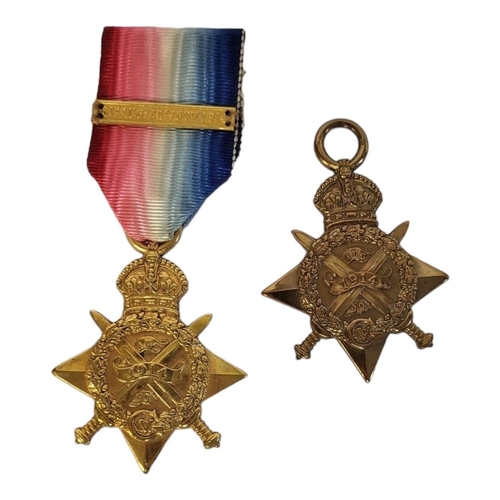 71 - TWO GEORGE V BRONZE MONS STAR MEDALS. ONE WITH RIBBON & CLASP 
Inscribed ‘5th AUGUST 5th-NOVEMBER 22... 