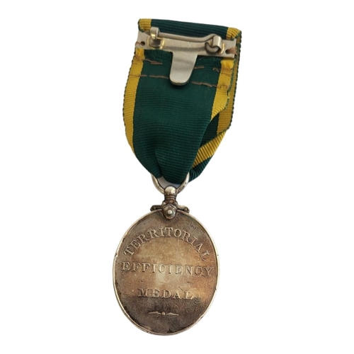 74 - A SILVER GEORGE V WORLD WAR I TERRITORIAL EFFICIENCY MEDAL
Ribbon attached. Issued to ‘265092 Pte A.... 
