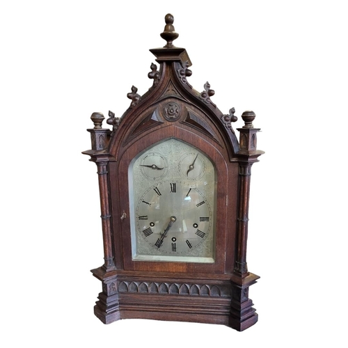 9 - LENZKIRCH, A LARGE 19TH CENTURY GERMAN OAK GOTHIC REVIVAL MANTLE CLOCK
Having an architectural form ... 