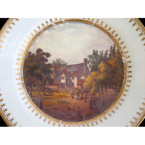325 - A PAIR OF SWANSEA CABINET PLATES CIRCA 1815-1817
Centrally polychrome enamel with a view of The Wild... 