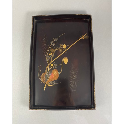 341 - A PAIR OF 20TH CENTURY JAPANESE BLACK LACQUERED INRO DECORATED SERVING TRAYS
Centrally inlaid with b... 