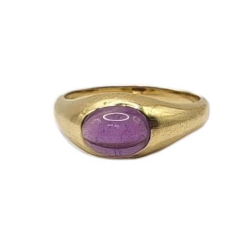 15 - A 14CT GOLD AND AMETHYST RING
The cabochon cut stone in plain form mount.
(size L)

Condition: good