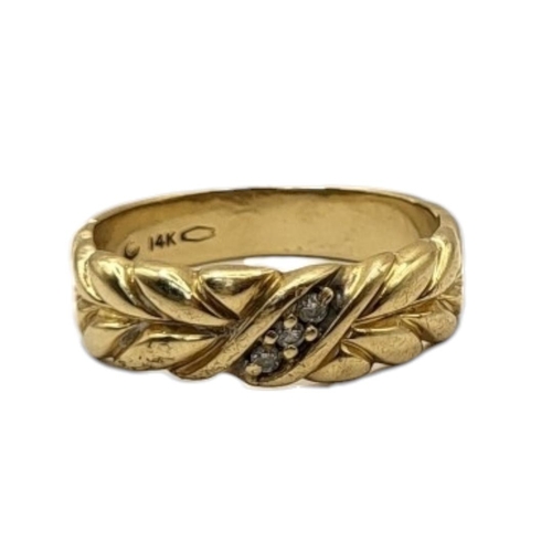 16 - A 14CT GOLD AND DIAMOND WHEATSHEAF RING
Having row of three round cut diamonds in a rope twist desig... 