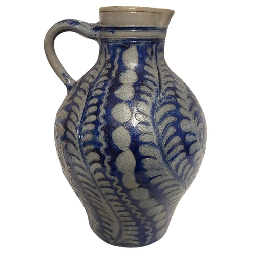 196 - A LARGE 19TH CENTURY GERMAN WESTERWALD STONEWARE STEIN JUG
Having a single handle, incised underglaz... 