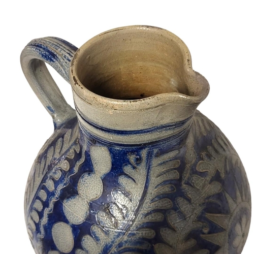 196 - A LARGE 19TH CENTURY GERMAN WESTERWALD STONEWARE STEIN JUG
Having a single handle, incised underglaz... 
