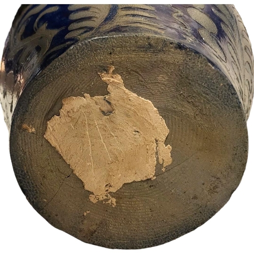 196 - A LARGE 19TH CENTURY GERMAN WESTERWALD STONEWARE STEIN JUG
Having a single handle, incised underglaz... 