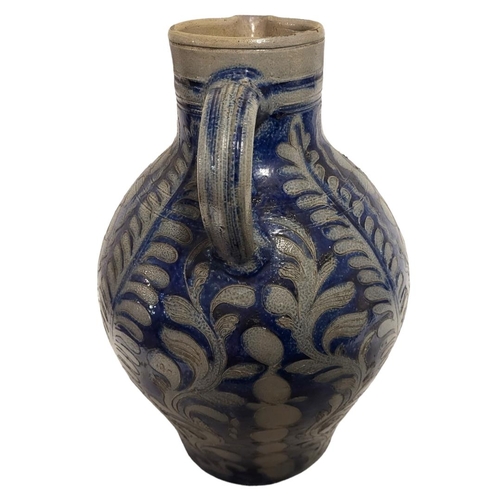 196 - A LARGE 19TH CENTURY GERMAN WESTERWALD STONEWARE STEIN JUG
Having a single handle, incised underglaz... 