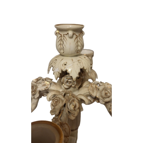 200 - SITZENDORF, A PAIR OF 19TH CENTURY GERMAN PORCELAIN FIGURAL CANDELABRA
Young male and female wearing... 