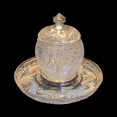 202 - A LARGE EARLY 20TH CENTURY CUT LEAD CRYSTAL PUNCH BARREL AND TRAY
Having deep cut swirled decoration... 
