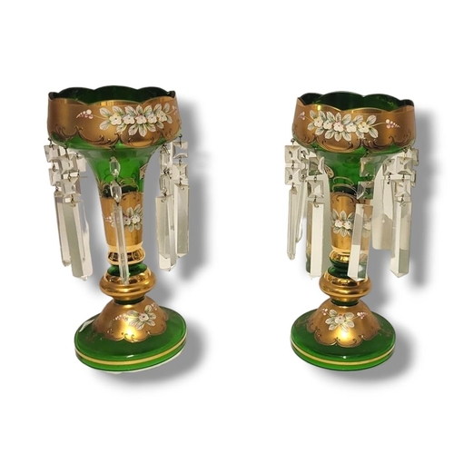 205 - A LARGE PAIR 19TH CENTURY BOHEMIAN GREEN GLASS LUSTRE VASES
Having overlaid gilt decoration with app... 