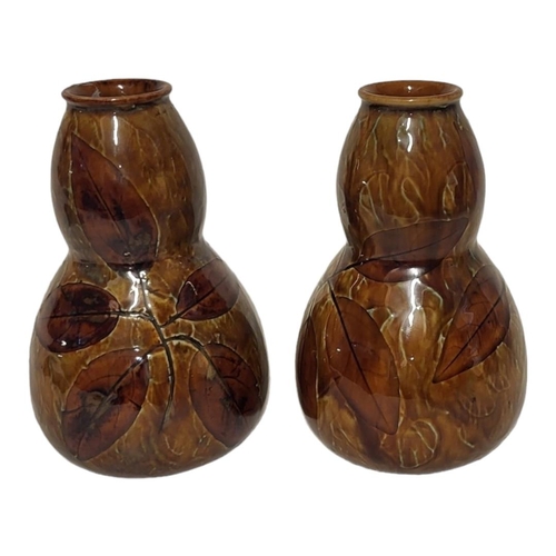 209 - A PAIR OF LATE 19TH/EARLY 20TH CENTURY ROYAL DOULTON STONEWARE VASES
Double gourd form with incised ... 