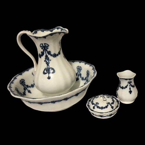212 - AN EDWARDIAN BISHOP & STONIER OF STAFFORDSHIRE FOUR PIECE PORCELAIN WASH SET
Maxwell pattern, blue t... 