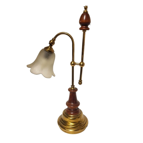 215 - AN EDWARDIAN STYLE BRASS AND MAHOGANY ADJUSTABLE DESK STUDY LAMP BASE
Embossed with scrolls, complet... 