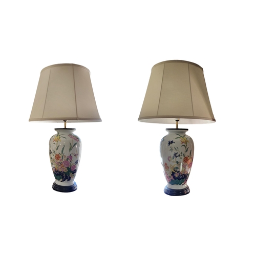 217 - A PAIR OF MODERN DESIGN ORIENTAL STYLE PORCELAIN LAMP BASES BY ELSTEAD LIGHTING FACTORY 
Both globul... 
