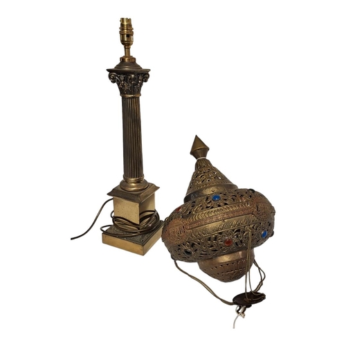 222 - A 20TH CENTURY INDIAN BRASS HANGING TEMPLE LANTERN
Having a pierced domed top and applied glass bead... 