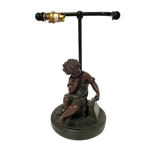 223 - AFTER AUGUSTE MOREAU, 1834 - 1917, A BRONZE FIGURAL LAMP
Seated child with book, cast mark to base ‘... 