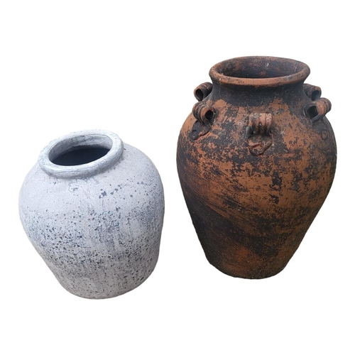 224 - A 20TH CENTURY SIX HANDLED TERRACOTTA AMPHORA SHAPED GARDEN VASE
Along with modern terracotta globul... 