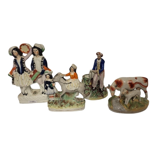 239 - A RARE VICTORIAN STAFFORDSHIRE FIGURE OF A TURK-OTTOMAN GENT IN TURBAN
A Staffordshire figural group... 