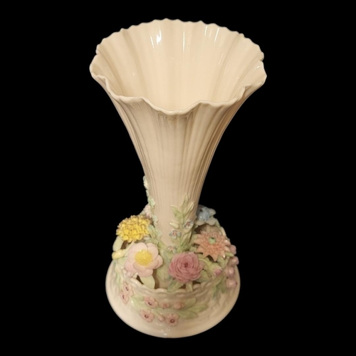 277 - BELLEEK, A 20TH CENTURY IRISH PORCELAIN TRUMPET VASE
The central reeded trumpet with applied floral ... 
