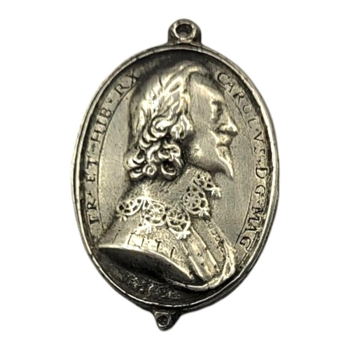 29 - KING CHARLES I, 1625 - 1649, A SILVER OVAL ROYALIST BADGE
Embossed portrait engraved with inscriptio... 