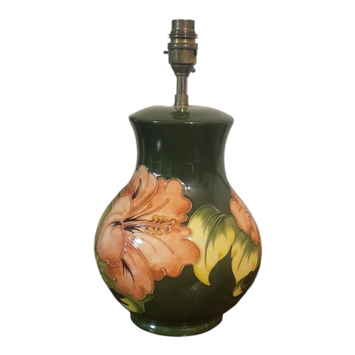 290 - MOORCROFT, A MID 20TH CENTURY ORIGINAL LAMP BASE, CIRCA 1960
Tubeline decorated with hibiscus patter... 